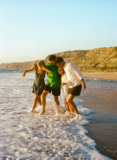 Friends enjoying the beach, embodying natural vitality with daily collagen and MSM essentials